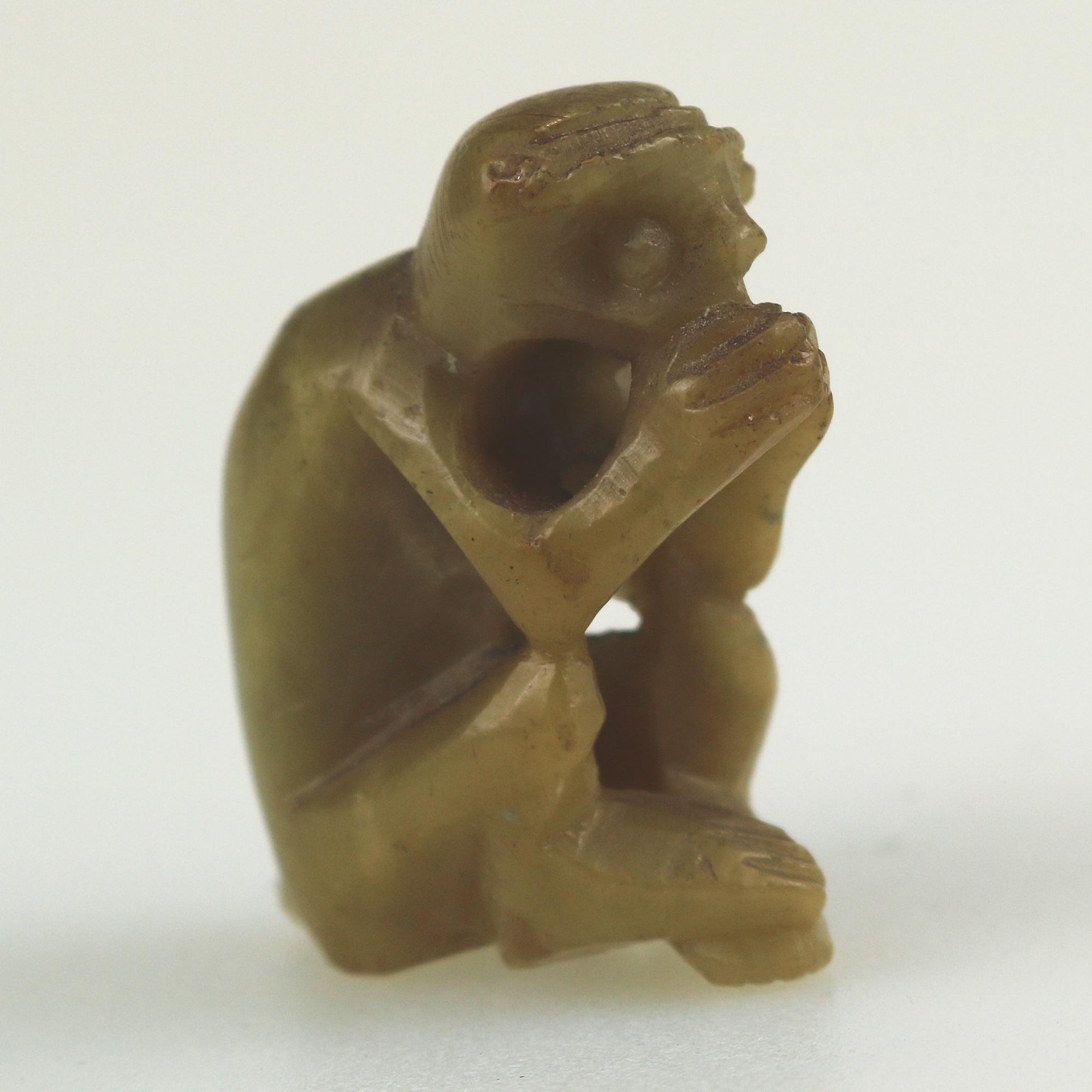 Charming antique hand carved hardstone nephrite cold monkey Netsuke C.19th/20thC