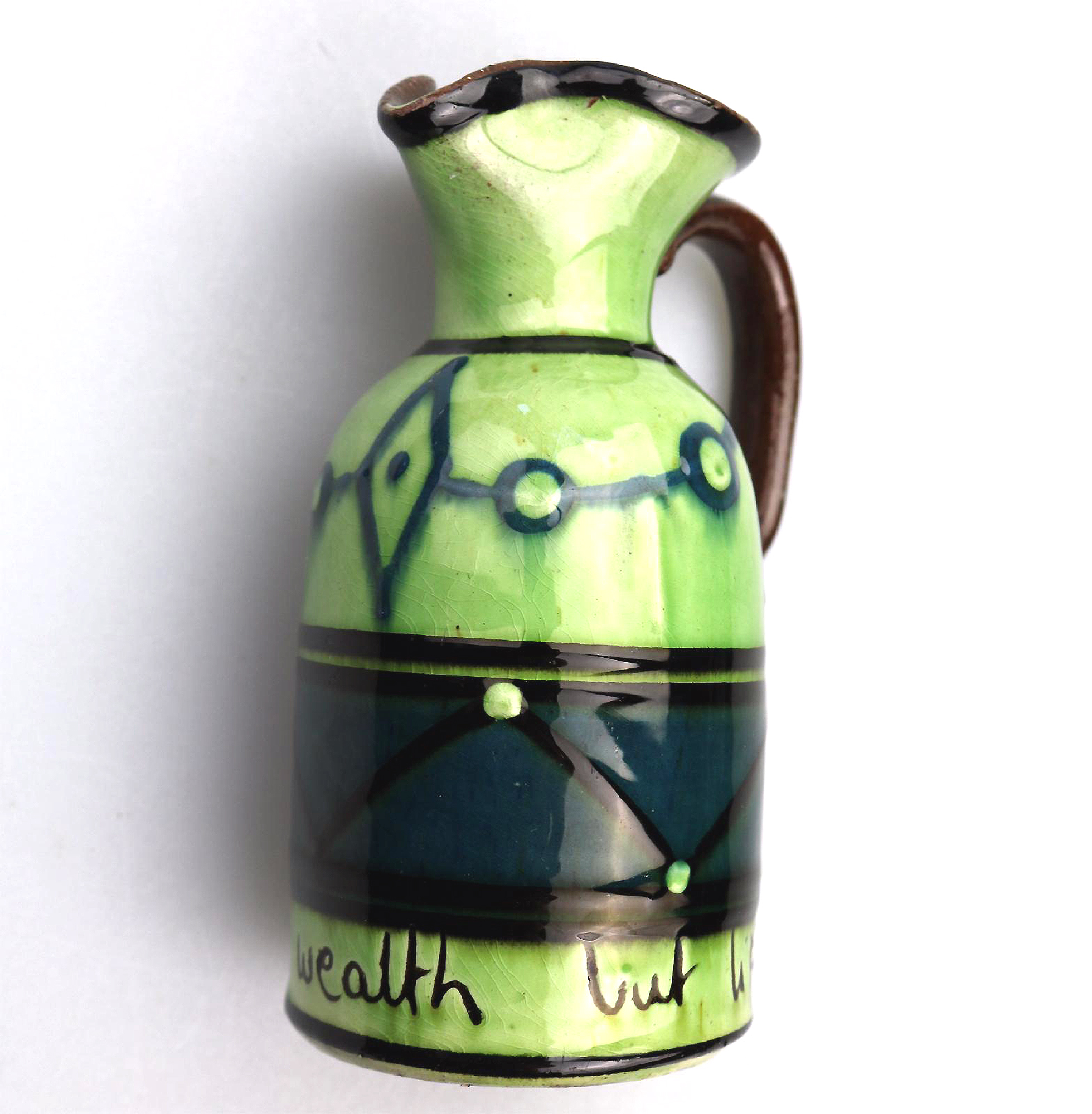 An unusual arts & crafts Art Pottery Torquay Devon Motto Creamer Jug C.1900