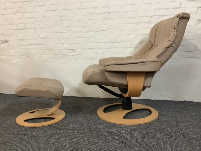 Stressless Reclining Swivel Chair And Footstool In Leather.