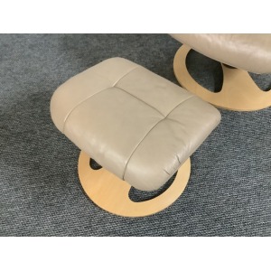 Stressless Reclining Swivel Chair And Footstool In Leather.
