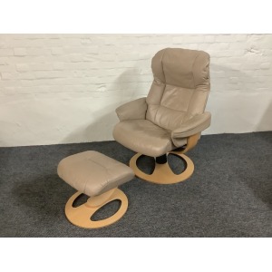 Stressless Reclining Swivel Chair And Footstool In Leather.