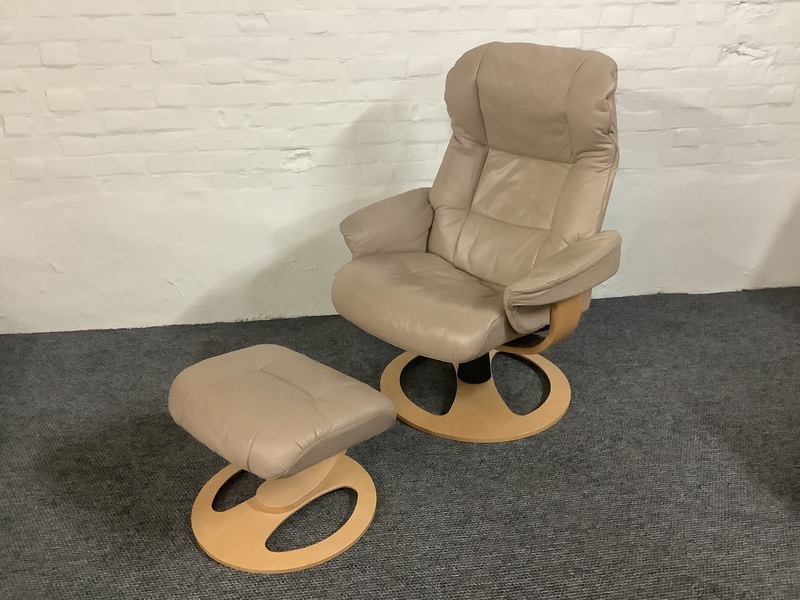 Stressless Reclining Swivel Chair And Footstool In Leather.