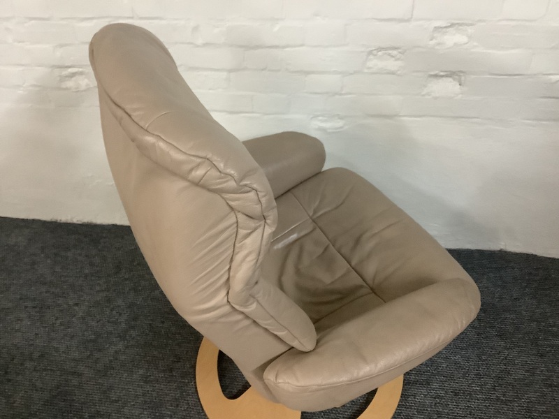 Stressless Reclining Swivel Chair And Footstool In Leather.