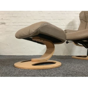 Stressless Reclining Swivel Chair And Footstool In Leather.