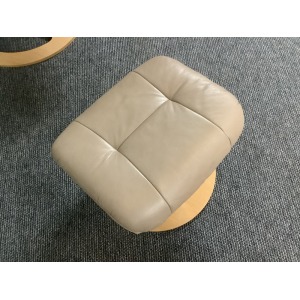 Stressless Reclining Swivel Chair And Footstool In Leather.