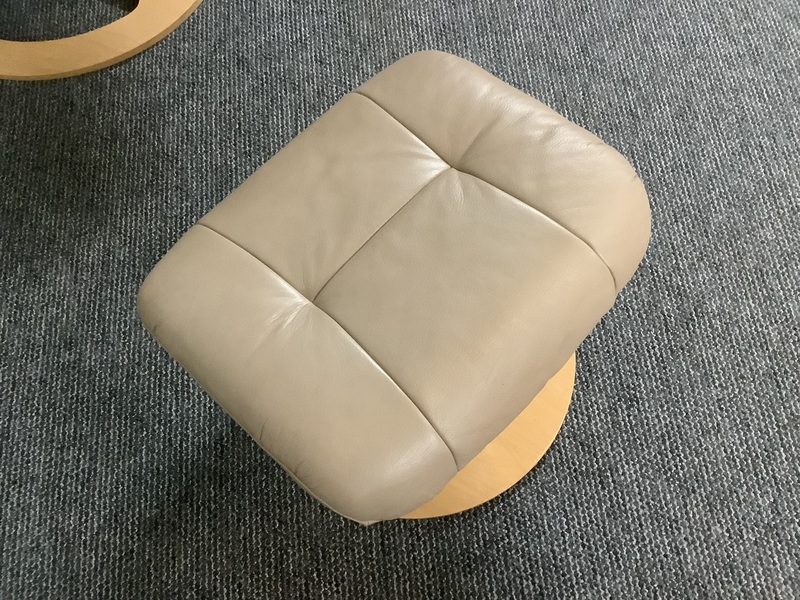 Stressless Reclining Swivel Chair And Footstool In Leather.