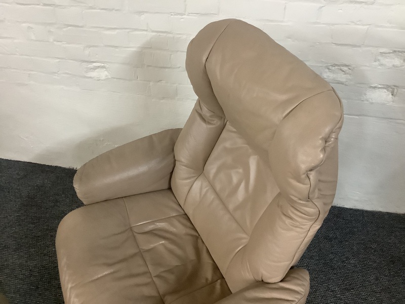 Stressless Reclining Swivel Chair And Footstool In Leather.