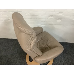 Stressless Reclining Swivel Chair And Footstool In Leather.