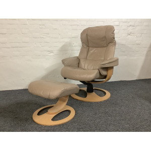Stressless Reclining Swivel Chair And Footstool In Leather.