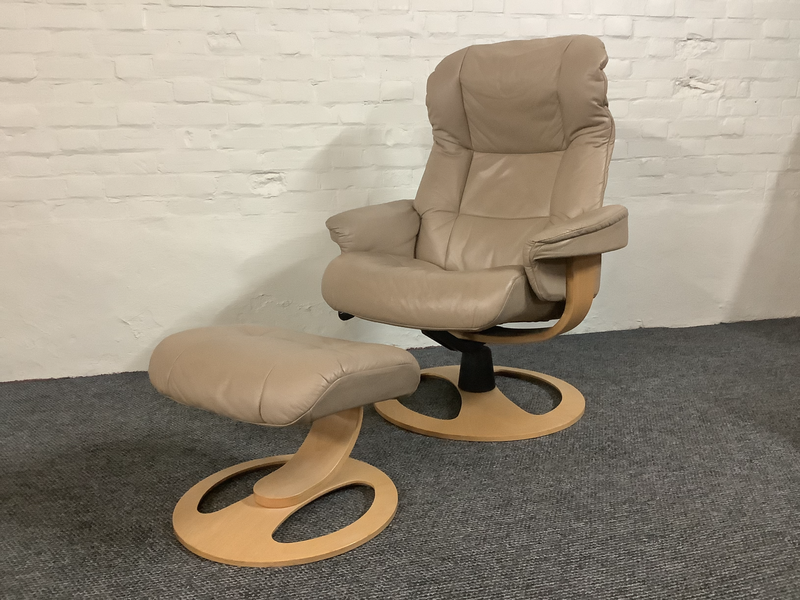 Stressless Reclining Swivel Chair And Footstool In Leather.