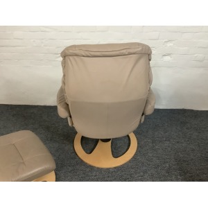 Stressless Reclining Swivel Chair And Footstool In Leather.