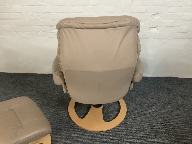Stressless Reclining Swivel Chair And Footstool In Leather.