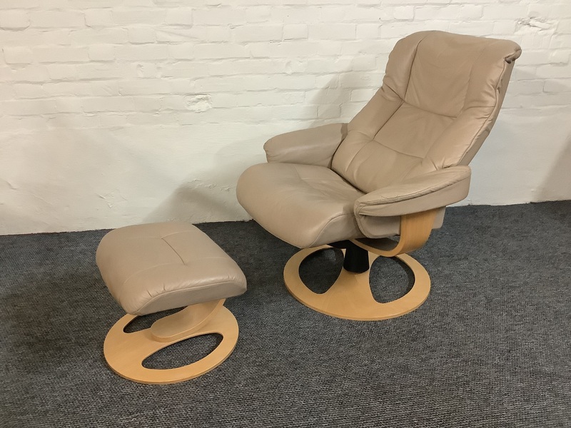 Stressless Reclining Swivel Chair And Footstool In Leather.