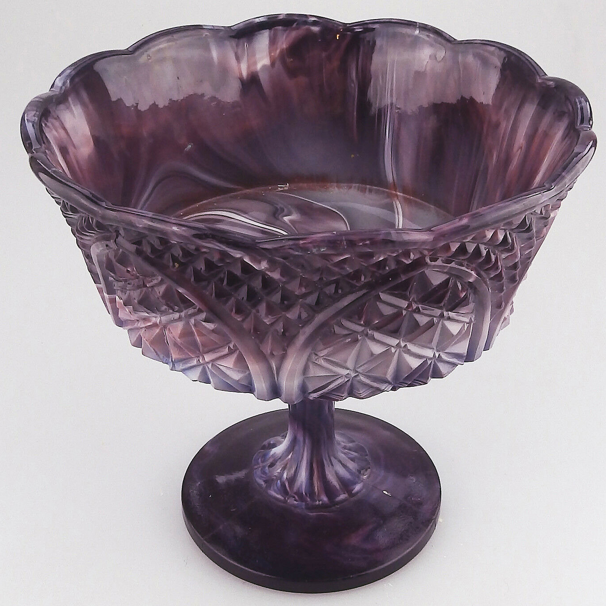 A large antique pressed glass purple amethyst malachite pedestal Bowl C.19thC