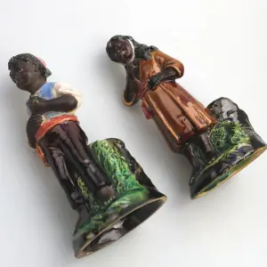 A pair antique majolica Bernhard Bloch pottery Children Figural Strikers C.19thC