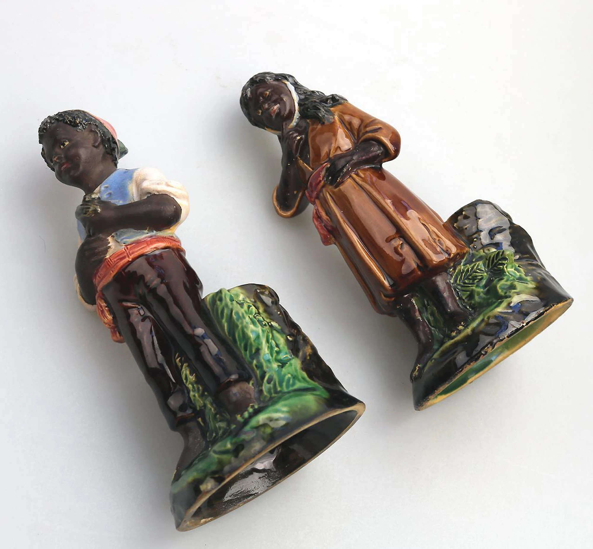 A pair antique majolica Bernhard Bloch pottery Children Figural Strikers C.19thC