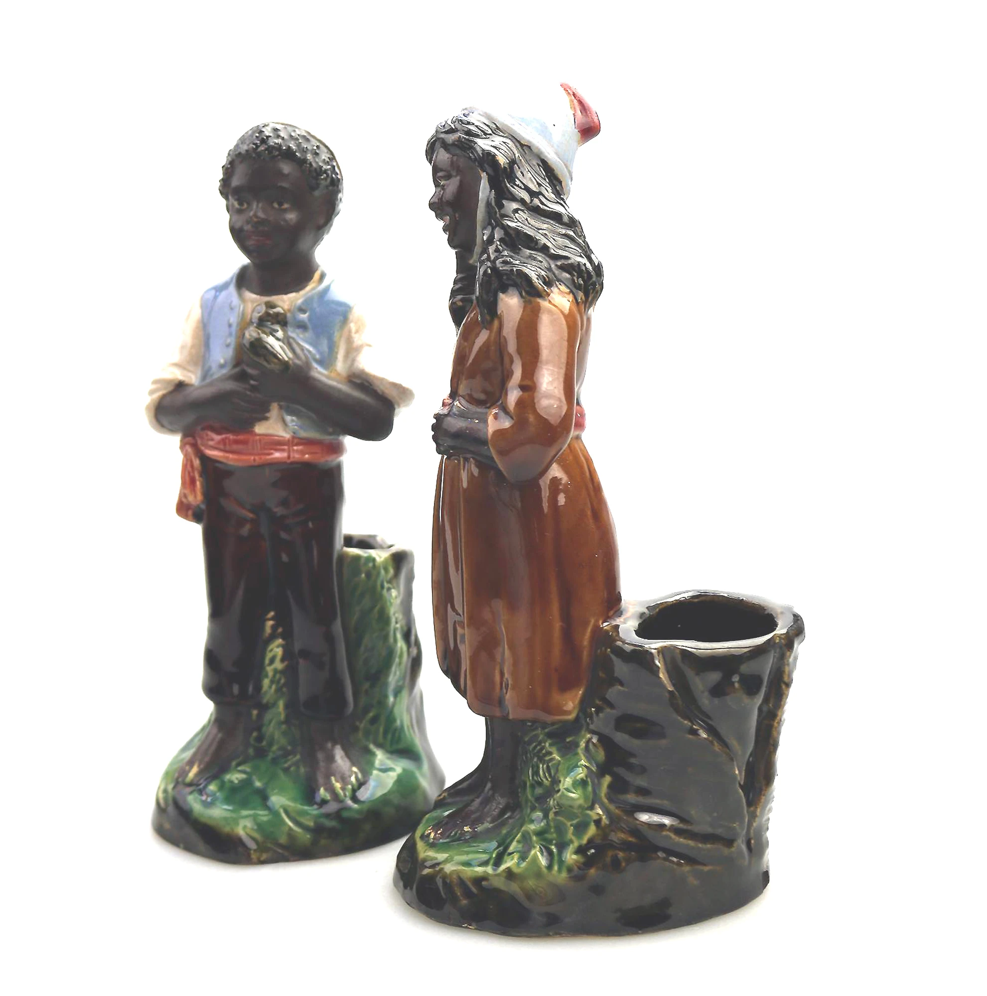 A pair antique majolica Bernhard Bloch pottery Children Figural Strikers C.19thC