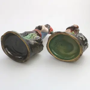 A pair antique majolica Bernhard Bloch pottery Children Figural Strikers C.19thC
