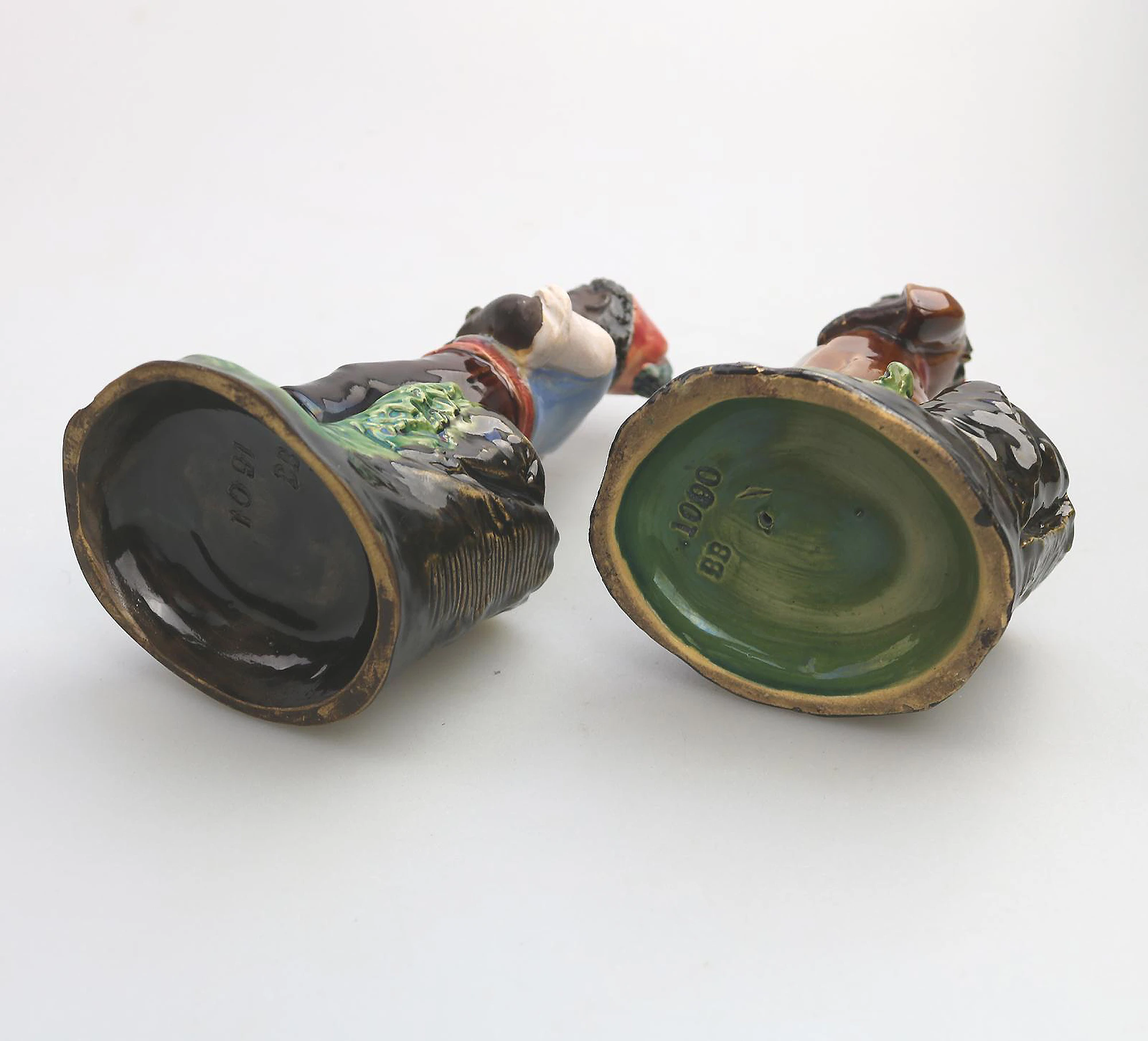 A pair antique majolica Bernhard Bloch pottery Children Figural Strikers C.19thC