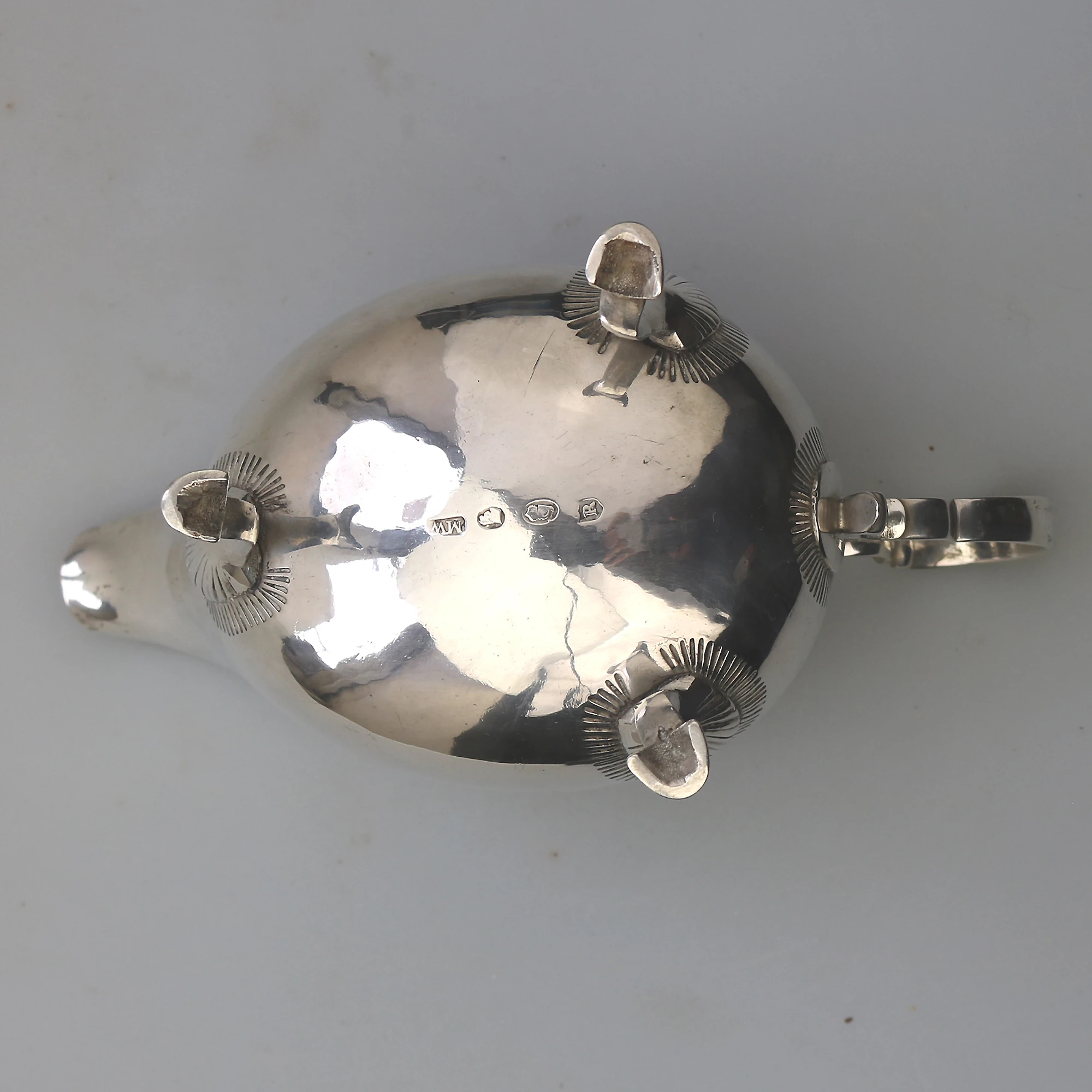 An antique Georgian Irish solid silver Sauceboat Gravy Jug by Mathew West C.1789