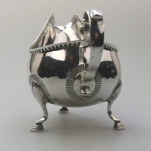 An antique Georgian Irish solid silver Sauceboat Gravy Jug by Mathew West C.1789