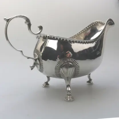 An antique Georgian Irish solid silver Sauceboat Gravy Jug by Mathew West C.1789 - Image 4