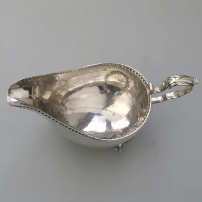 An antique Georgian Irish solid silver Sauceboat Gravy Jug by Mathew West C.1789 - Image 5