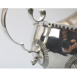 An antique Georgian Irish solid silver Sauceboat Gravy Jug by Mathew West C.1789