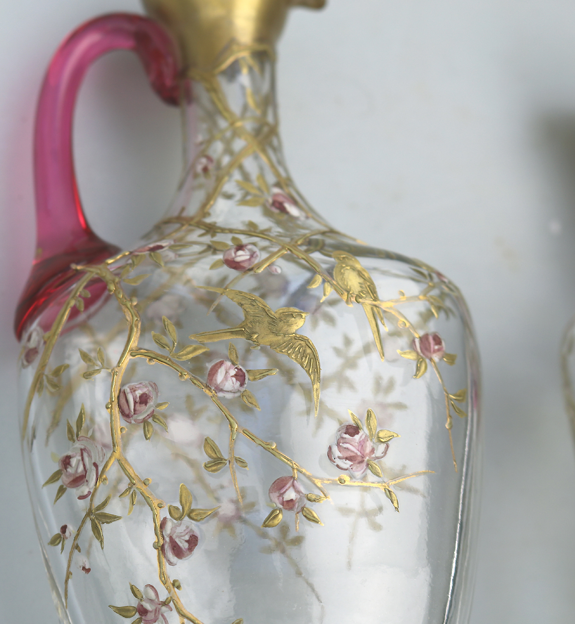 A superb pair antique cranberry glass & gilt overlaid Moser type Ewers C.19thC
