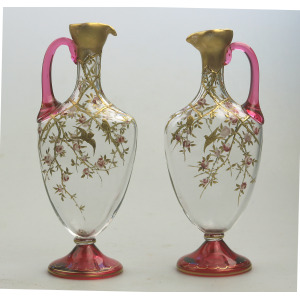 A superb pair antique cranberry glass & gilt overlaid Moser type Ewers C.19thC