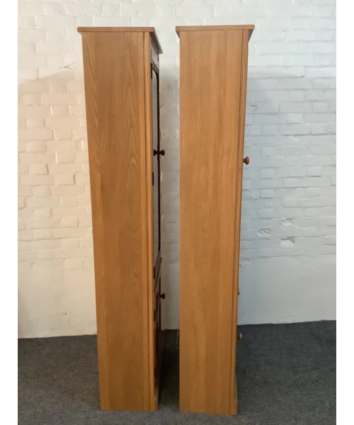 Pair Of Ercol Mural Glazed Cabinets In Light Finish.