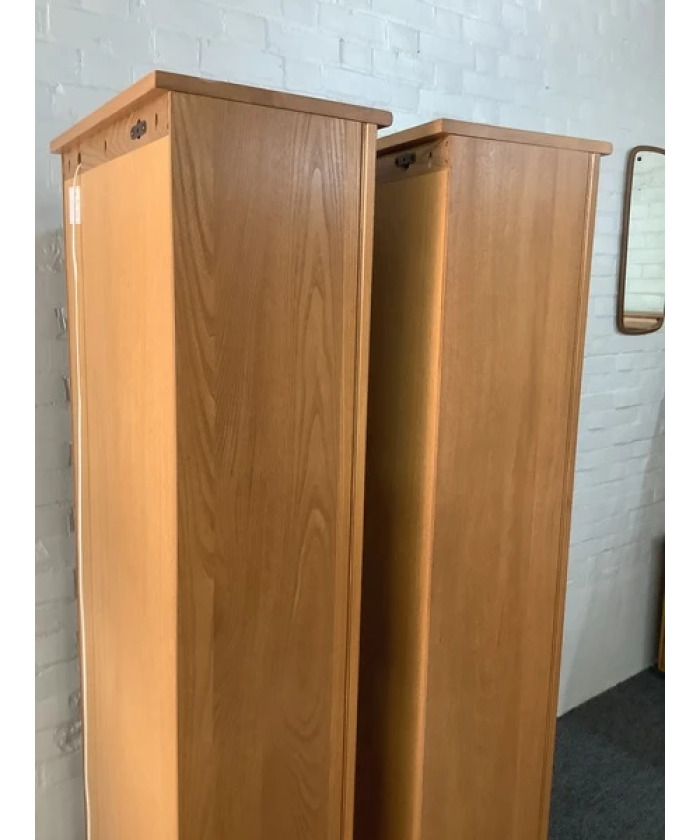 Pair Of Ercol Mural Glazed Cabinets In Light Finish.