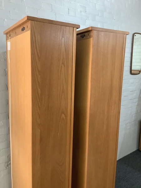 Pair Of Ercol Mural Glazed Cabinets In Light Finish.