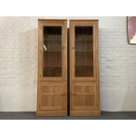 Pair Of Ercol Mural Glazed Cabinets In Light Finish.
