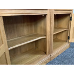 Pair Of Ercol Mural Glazed Cabinets In Light Finish.