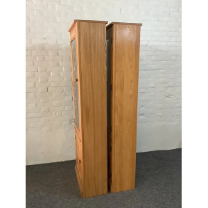 Pair Of Ercol Mural Glazed Cabinets In Light Finish.