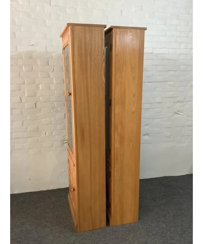 Pair Of Ercol Mural Glazed Cabinets In Light Finish.