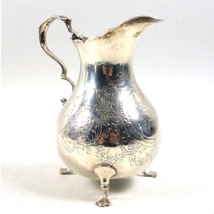 A good antique Victorian English solid silver floral engraved Jug 117g C.1870