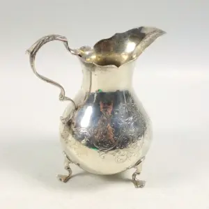 A good antique Victorian English solid silver floral engraved Jug 117g C.1870