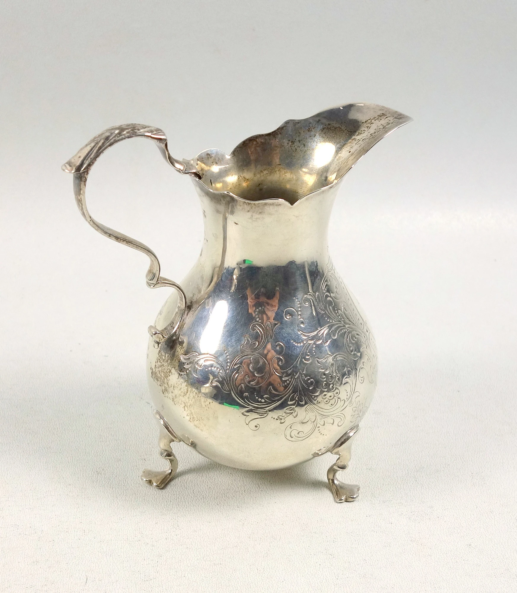 A good antique Victorian English solid silver floral engraved Jug 117g C.1870
