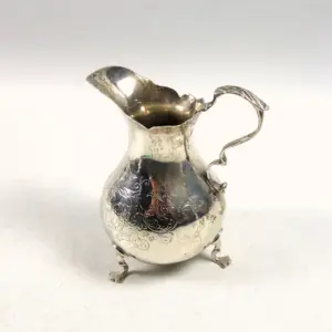 A good antique Victorian English solid silver floral engraved Jug 117g C.1870