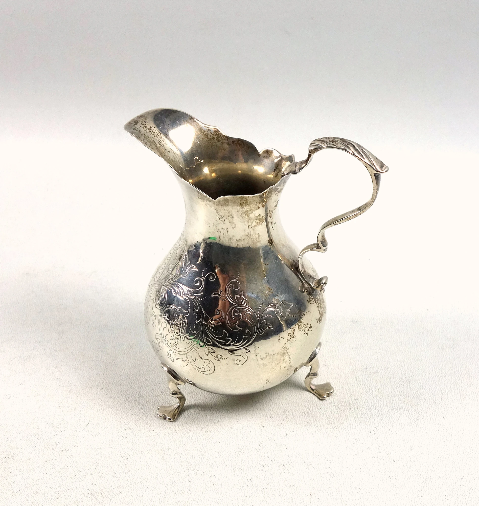 A good antique Victorian English solid silver floral engraved Jug 117g C.1870