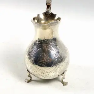 A good antique Victorian English solid silver floral engraved Jug 117g C.1870
