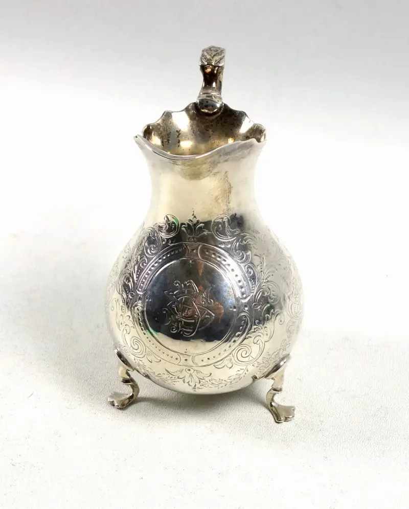 A good antique Victorian English solid silver floral engraved Jug 117g C.1870