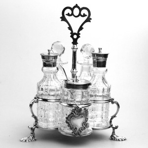 A fine antique silver plate Warwick type cut glass 5 bottle Cruet Stand C.1863