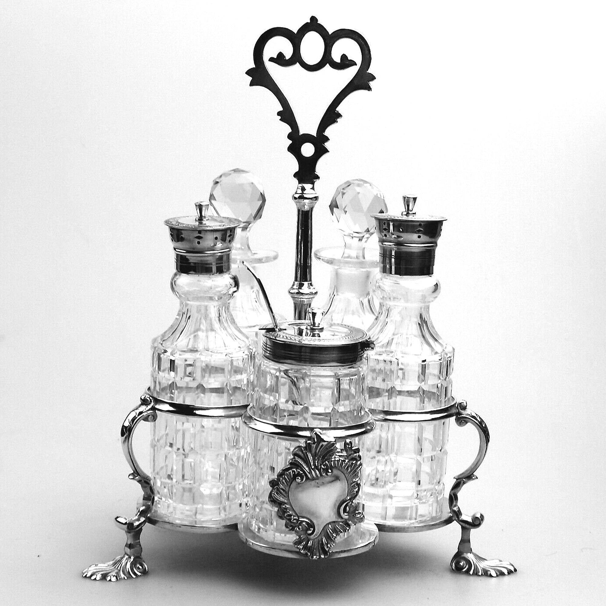A fine antique silver plate Warwick type cut glass 5 bottle Cruet Stand C.1863