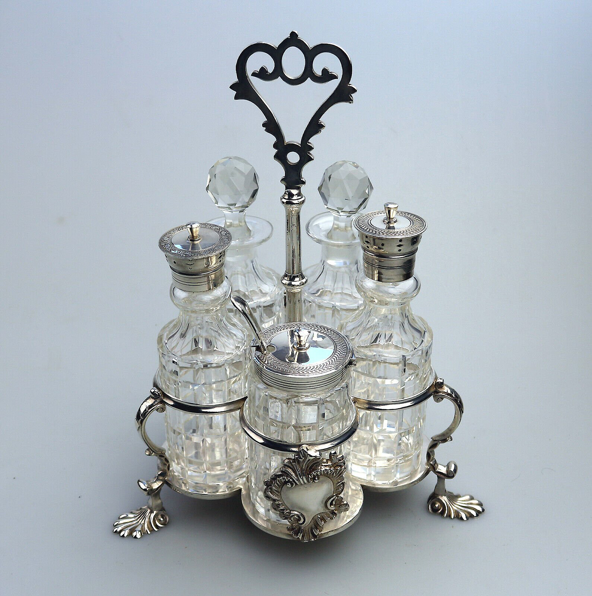 A fine antique silver plate Warwick type cut glass 5 bottle Cruet Stand C.1863