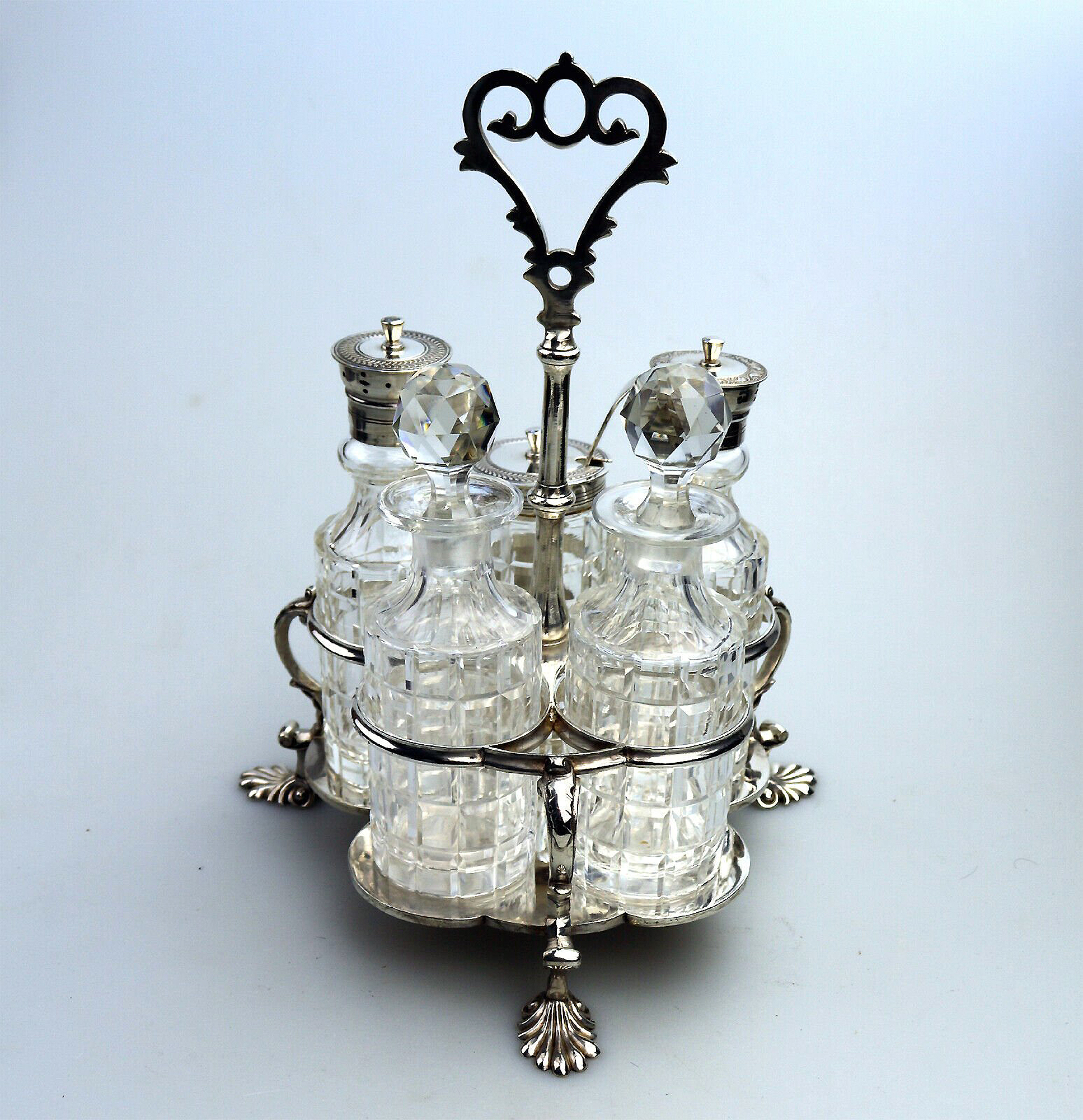 A fine antique silver plate Warwick type cut glass 5 bottle Cruet Stand C.1863